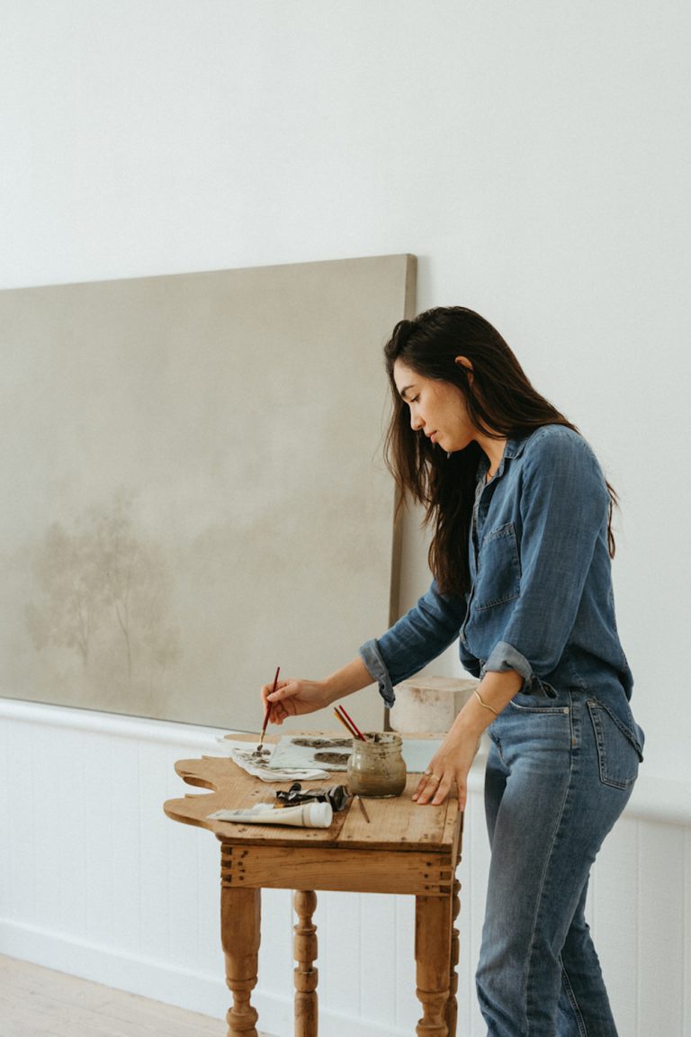 Woman painting.