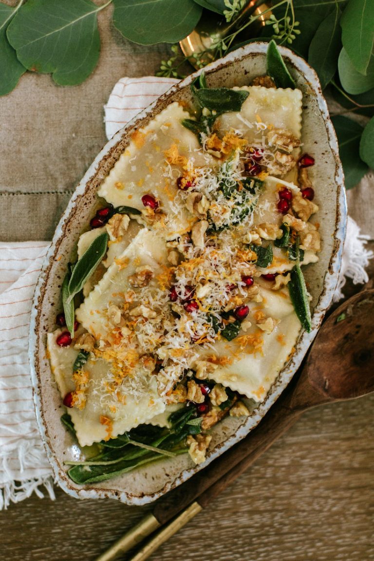 Butternut squash ravioli with walnuts, sage and orange-brown butter