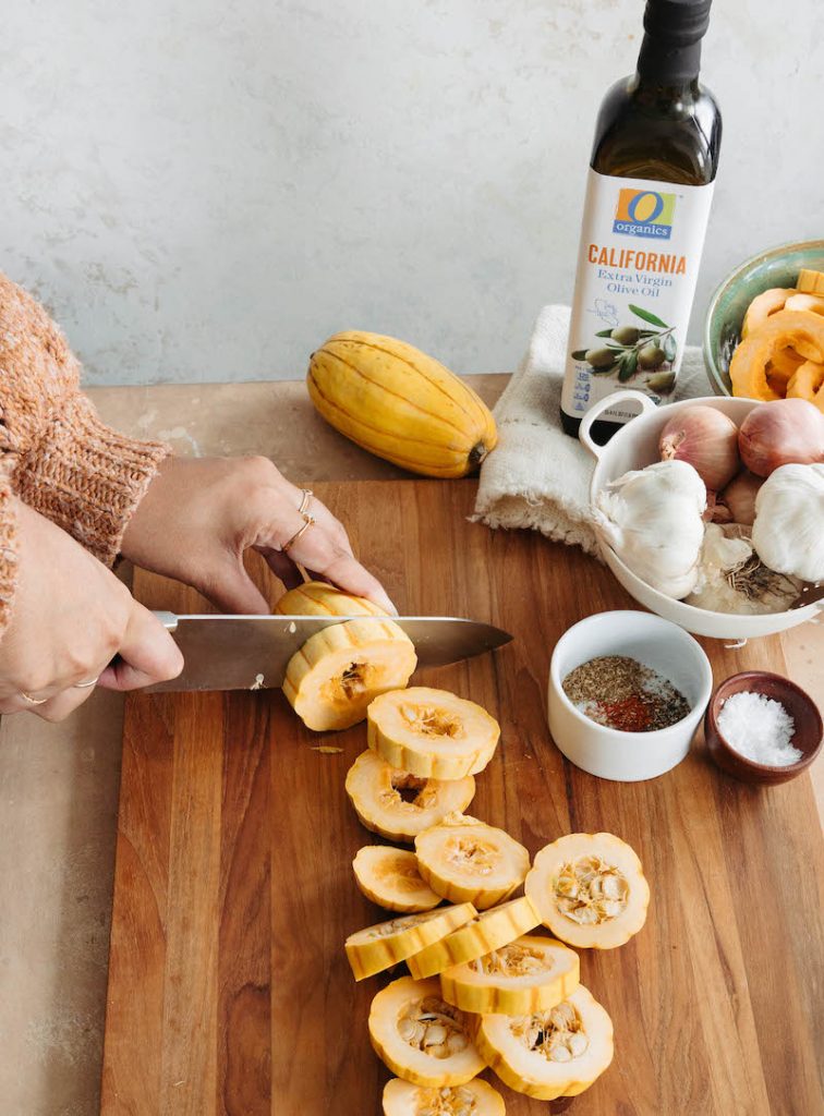 Chopping delicata squash.