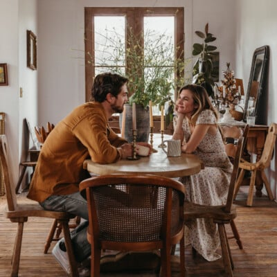 Couple sitting at table.