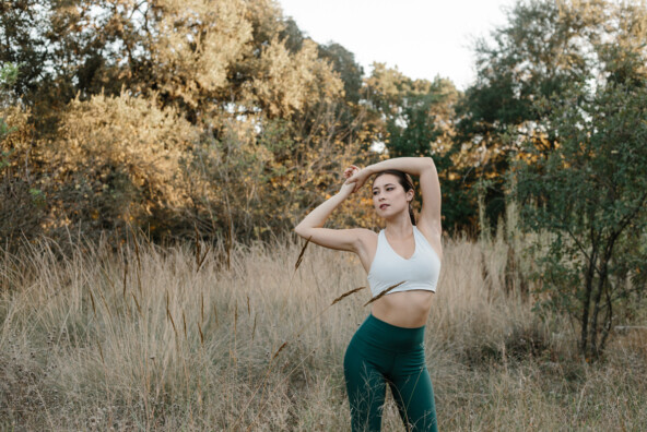 Woman stretching outside.