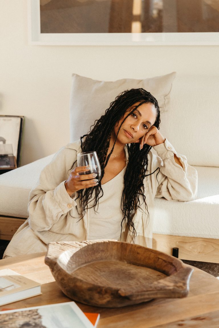 Woman drinking wine.