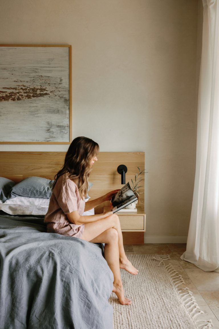 Woman reading in bed.