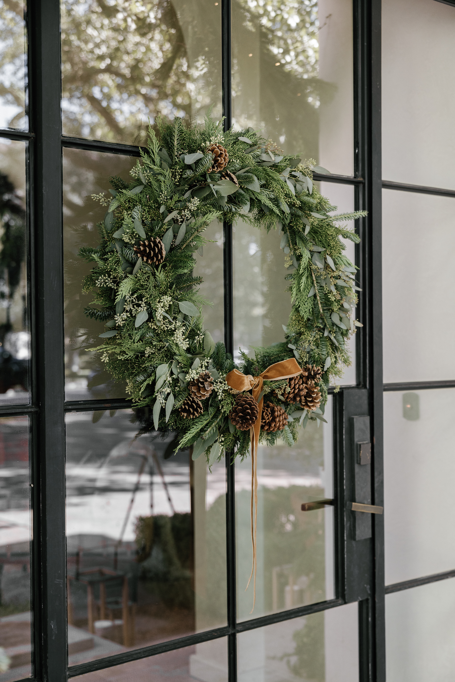 Camille Styles Holiday Decor 2023-Christmas front porch decor, casa zuma holiday wreath, evergreen