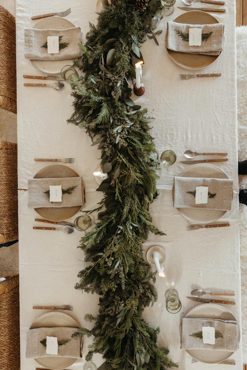 Camille Styles Holiday Decor 2023 - holiday table with evergreen runner, casa zuma dinnerware
