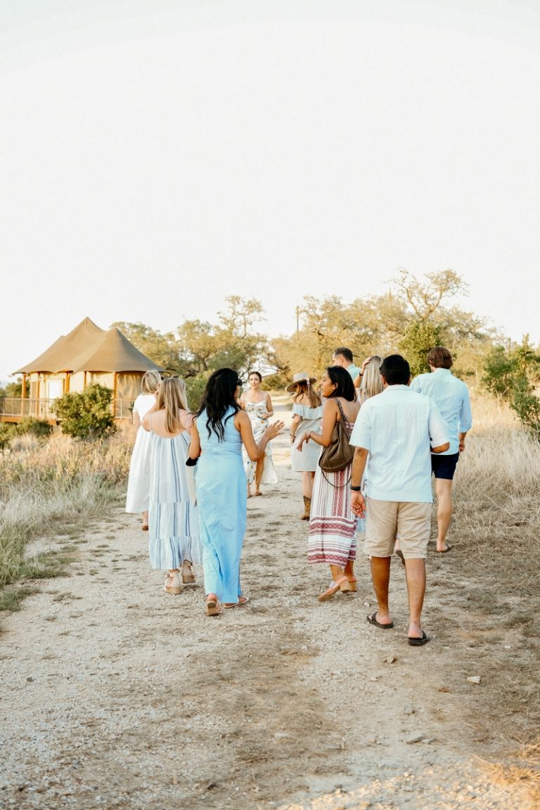 Group of people walking outside.