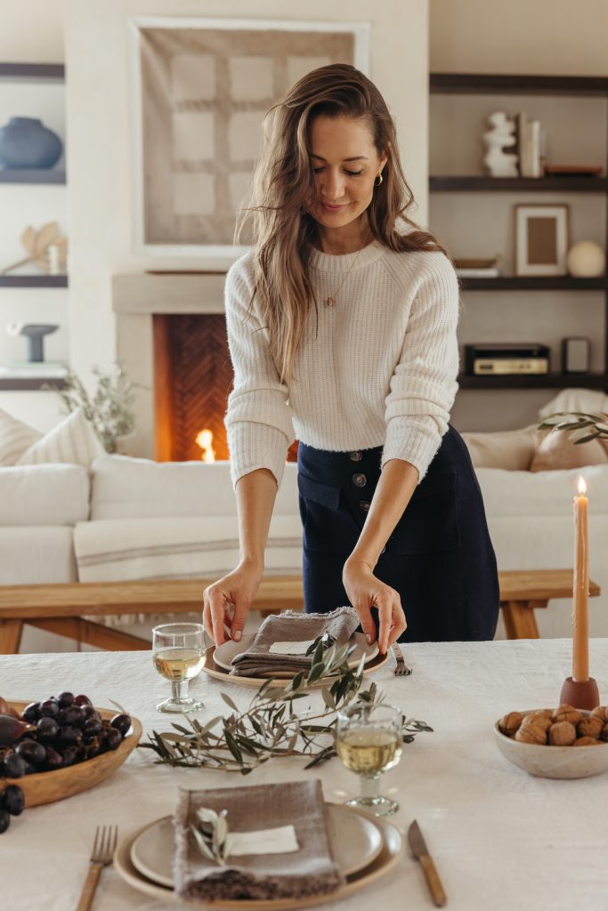 thanksgiving table 2023, warm and natural harvest inspiration, camille setting the table