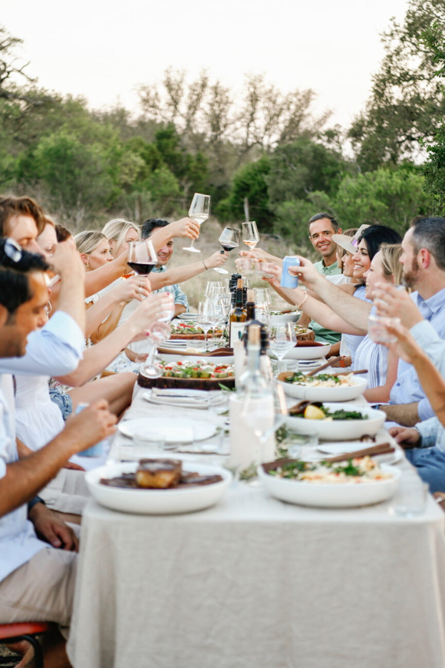 Wine cheers at dinner party.
