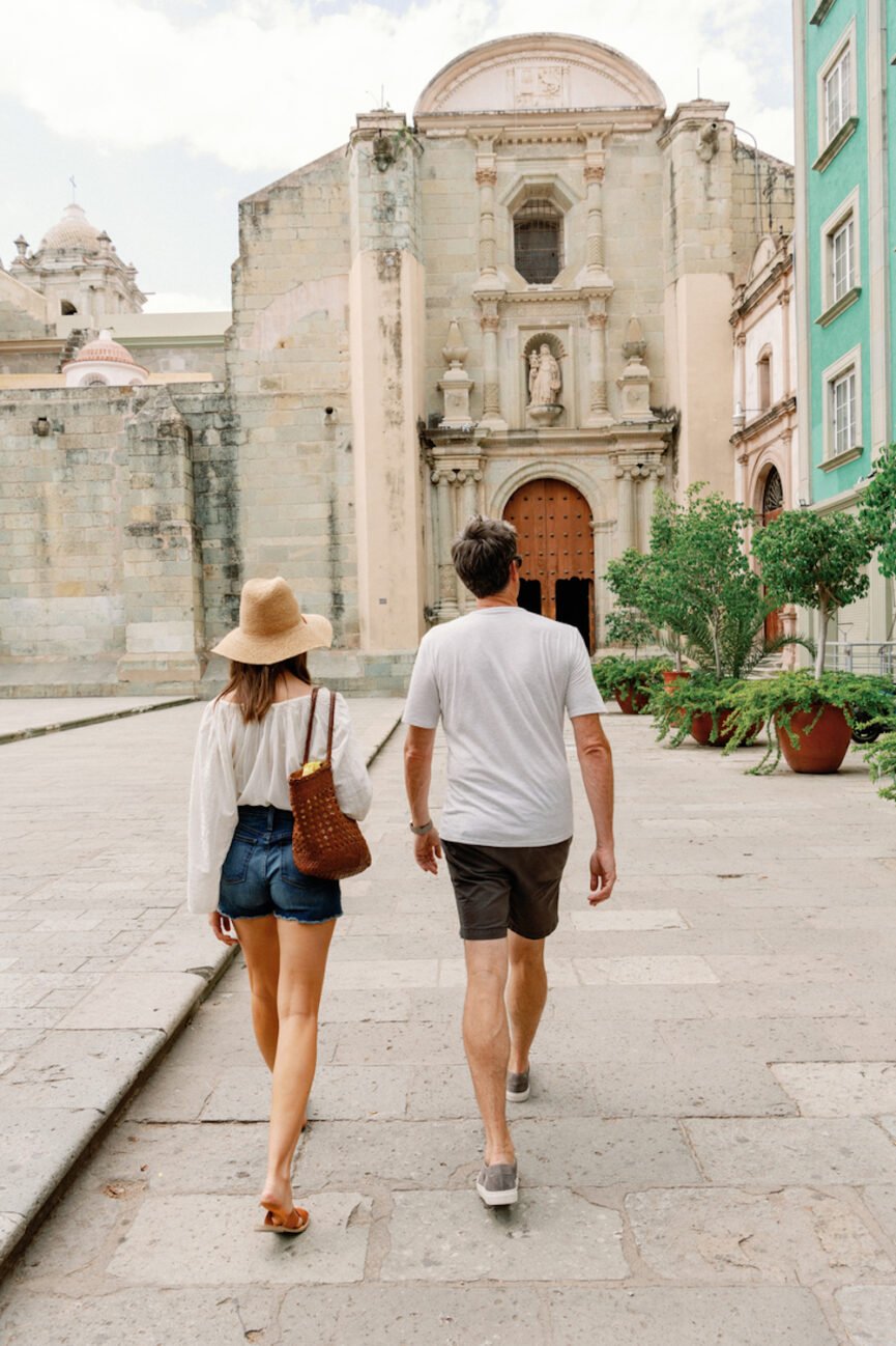 Couple walking in Oaxaca.