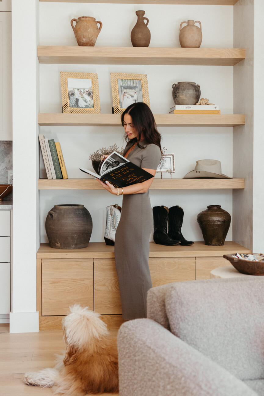 woman looking through photo book