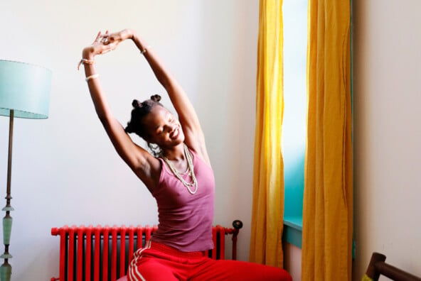 Woman stretching on exercise ball