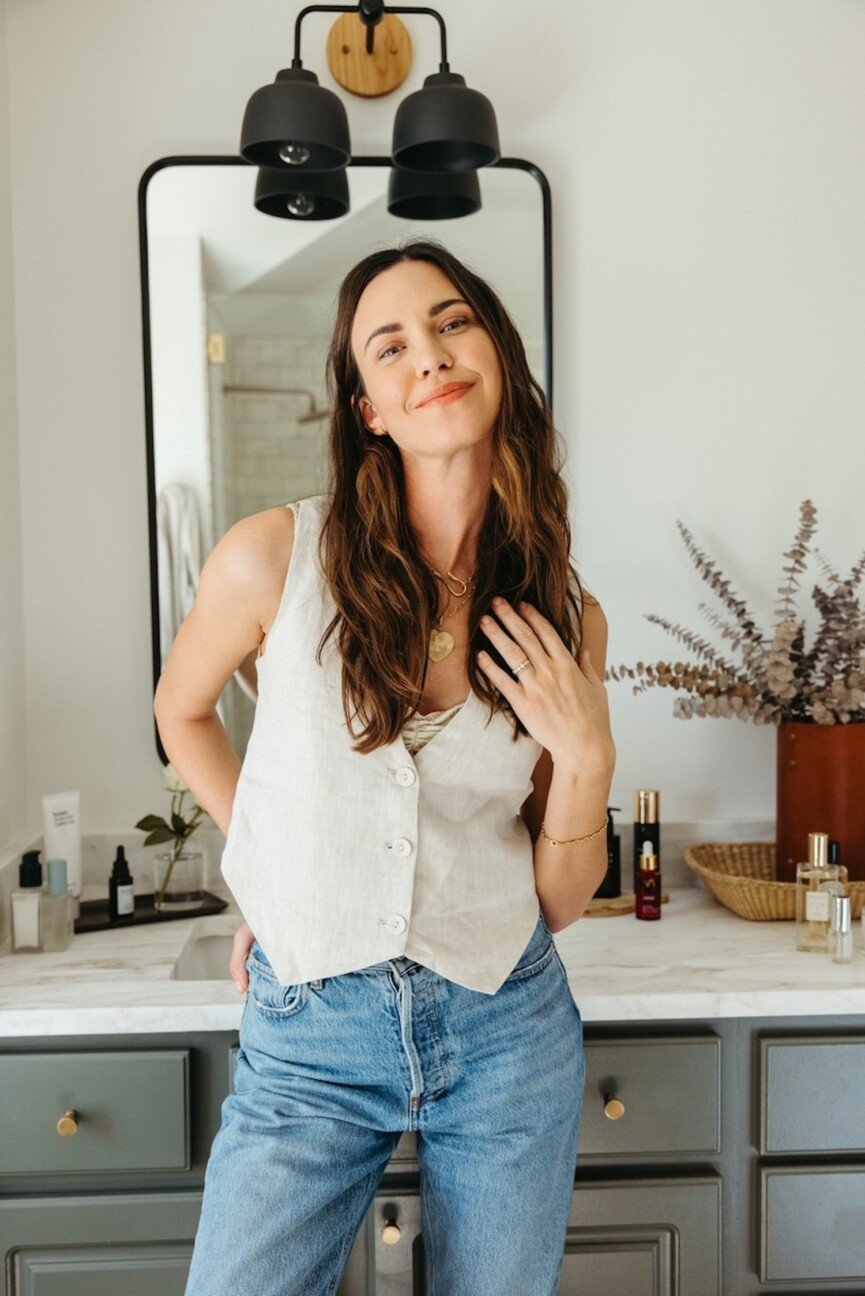 Odette Annable smiling in bathroom