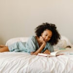 Woman reading in bed.