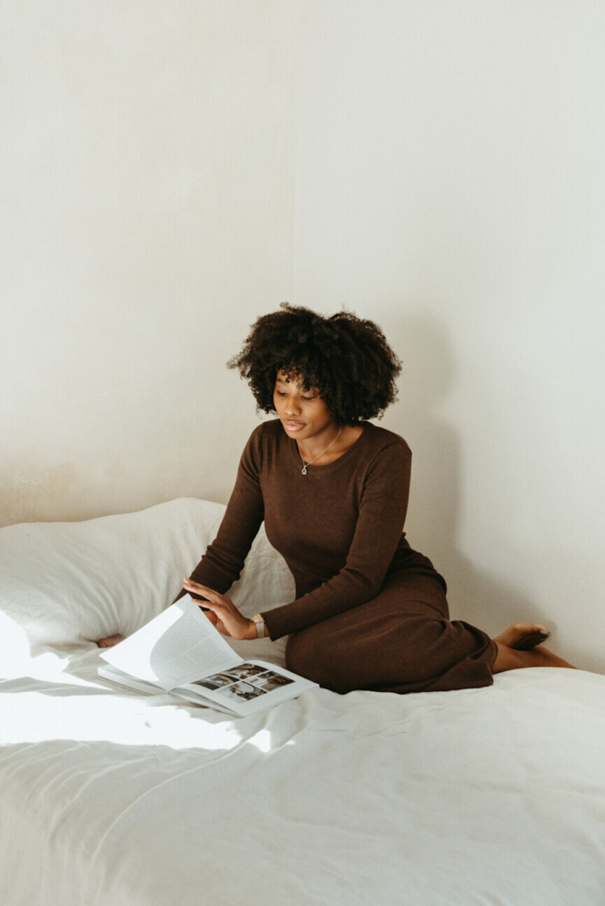 Woman reading in bed.