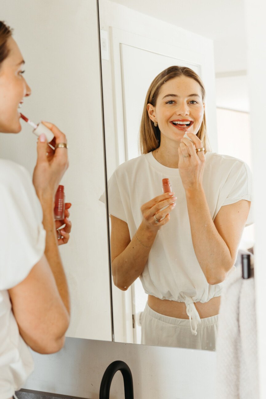 Woman smiling gut health oral hygiene.