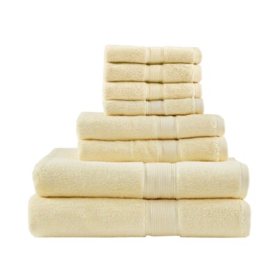 A stack of 8 butter yellow bath towels