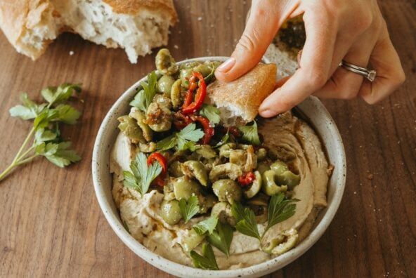 bowl of marinated olives with hummus_marinated olives recipe