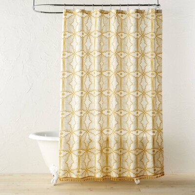 Butterfly print yellow shower curtain with a tub from Target