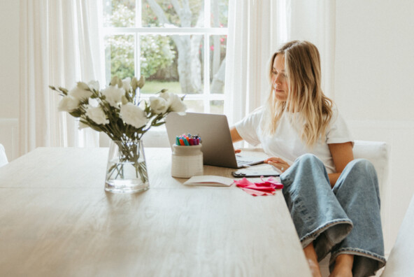 Blonde woman typing on computer_postpartum sex