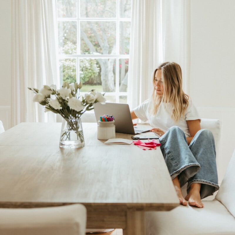 Blonde woman typing on computer_postpartum sex