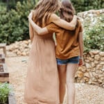 Mother daughter embrace_breast self exam
