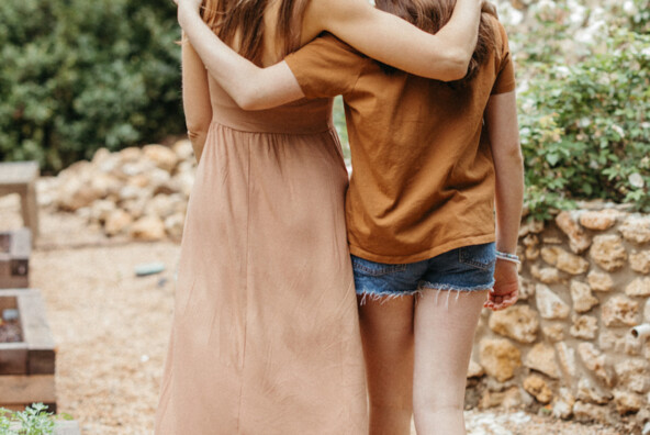 Mother daughter embrace_breast self exam