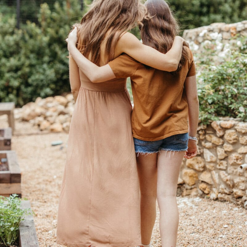 Mother daughter embrace_breast self exam