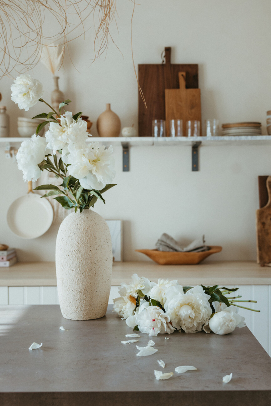 peonies in vase