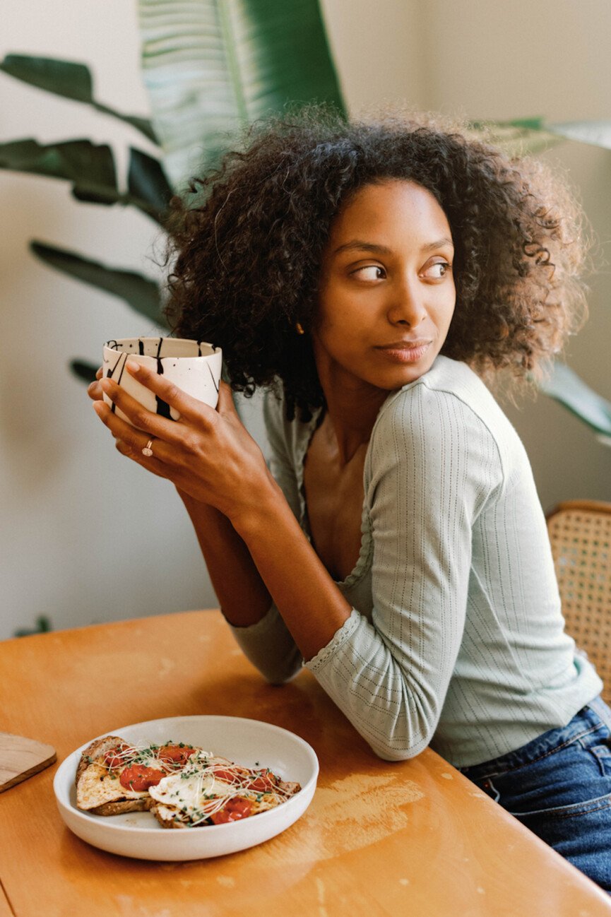 Woman drinking breakfast tea.