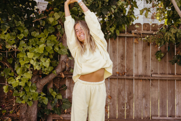 Woman stretching outside.