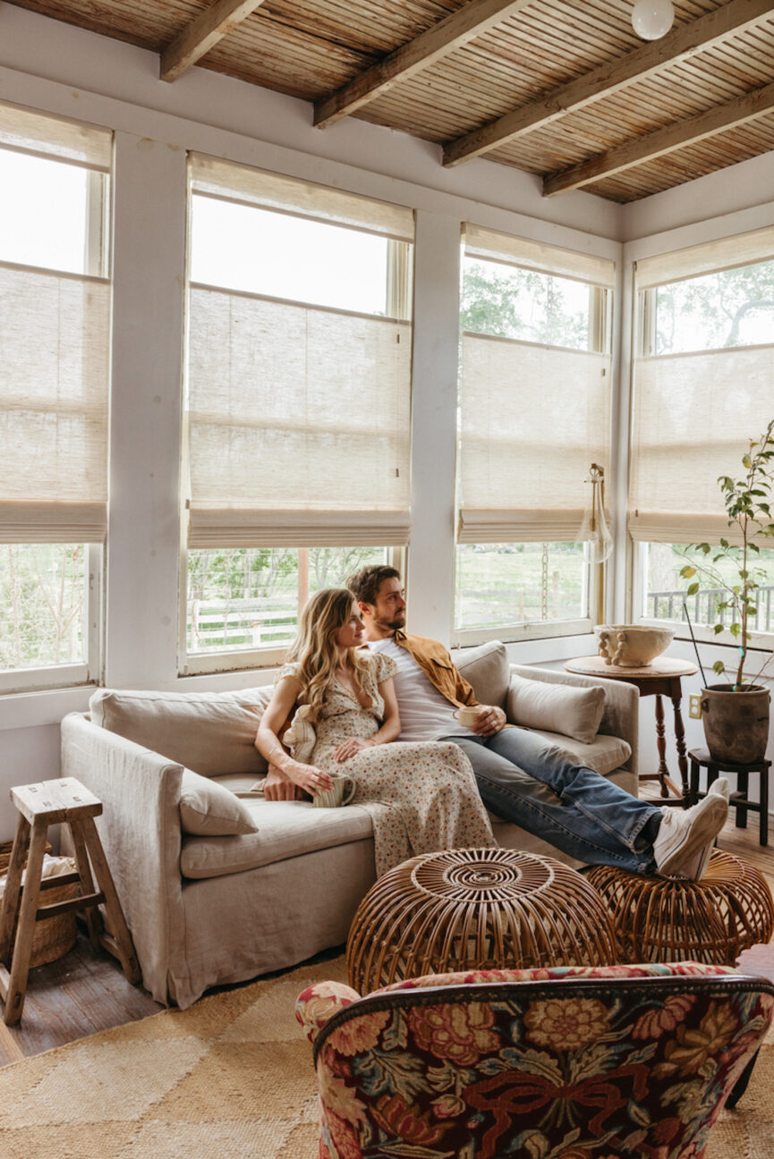 Couple sitting on couch.