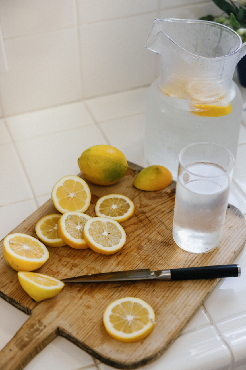 Lemon slices on cutting board.