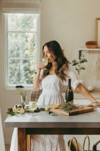 camille styles holding limoncello spritz
