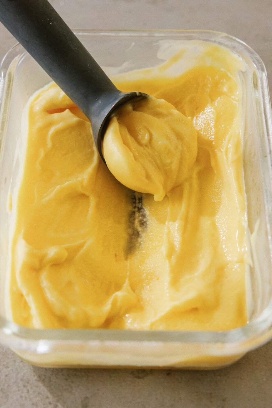 Mango sorbet in glass container