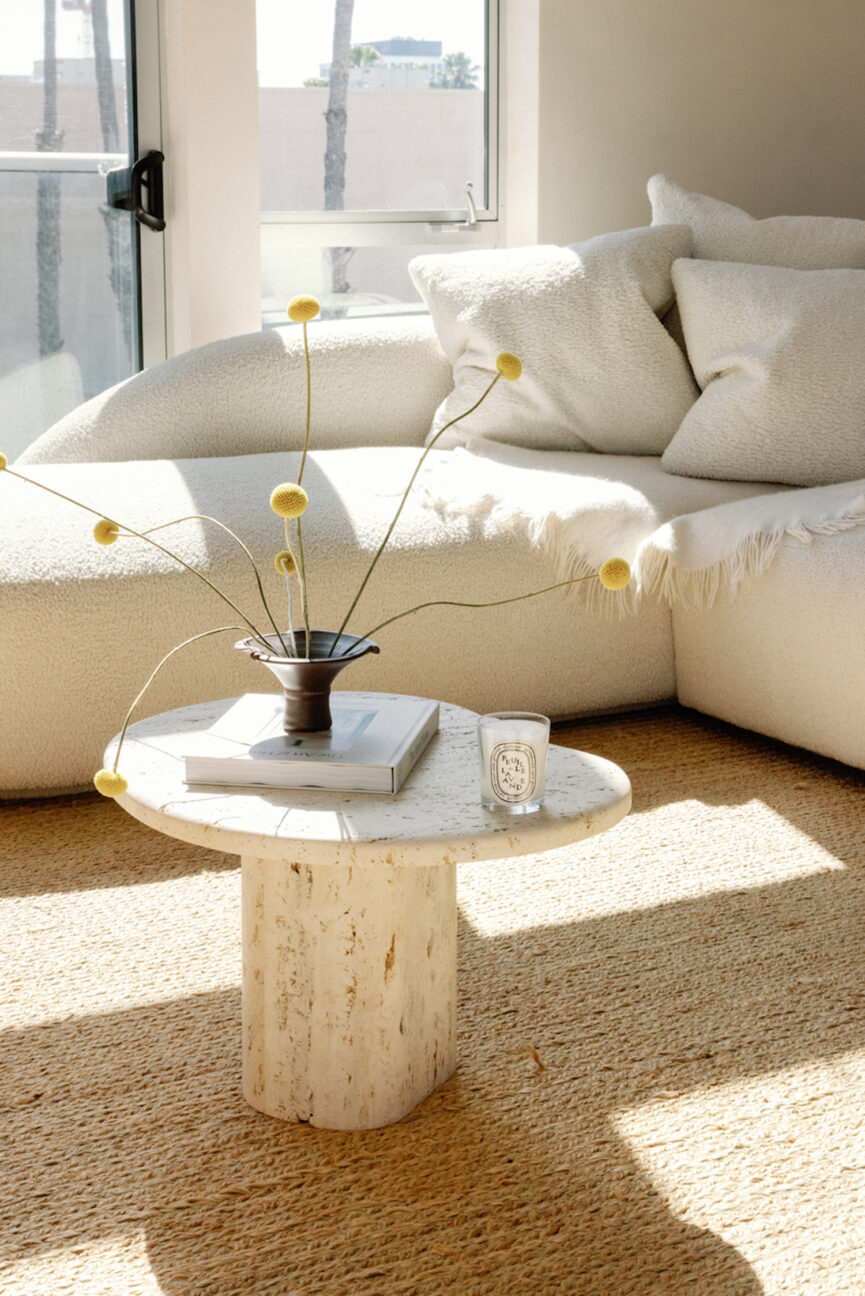 White minimalist couch and coffee table.