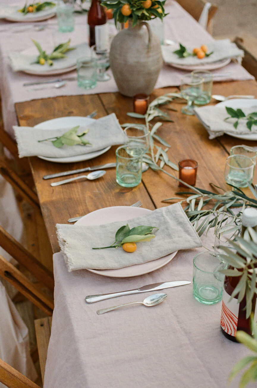 The dining table is set outside.