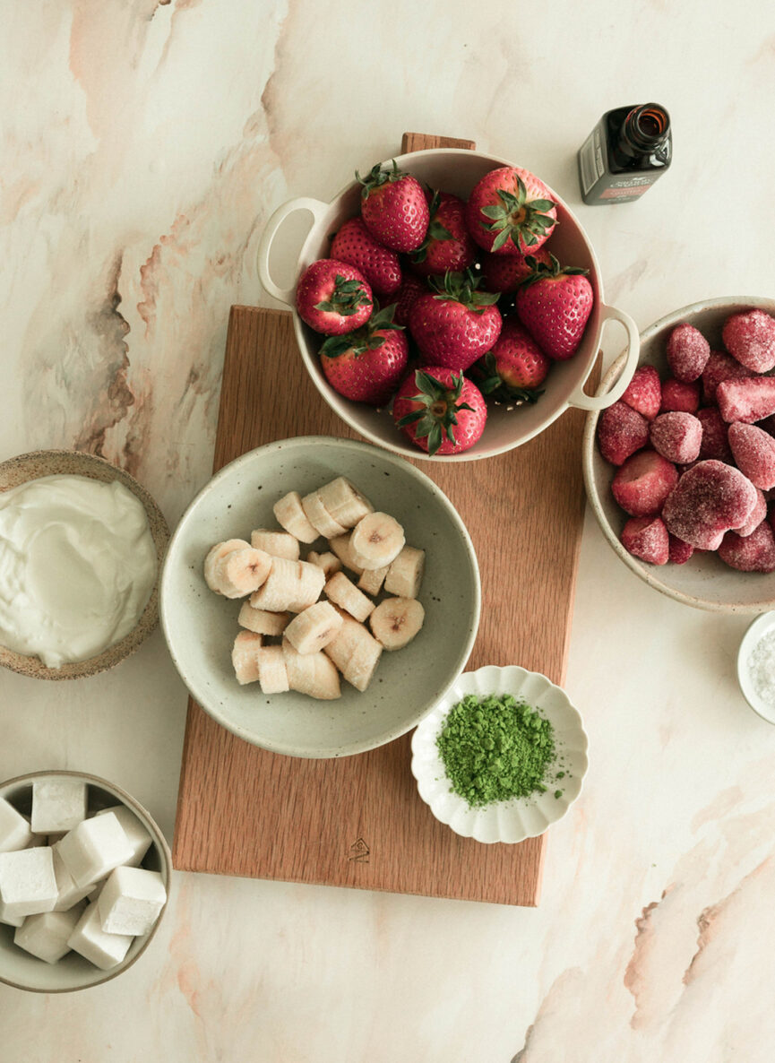 Strawberry matcha smoothie ingredients.