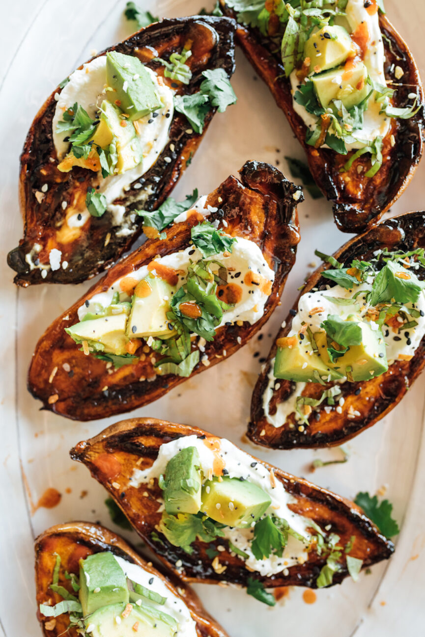 Crispy roasted sweet potatoes with yogurt, herbs and all spices