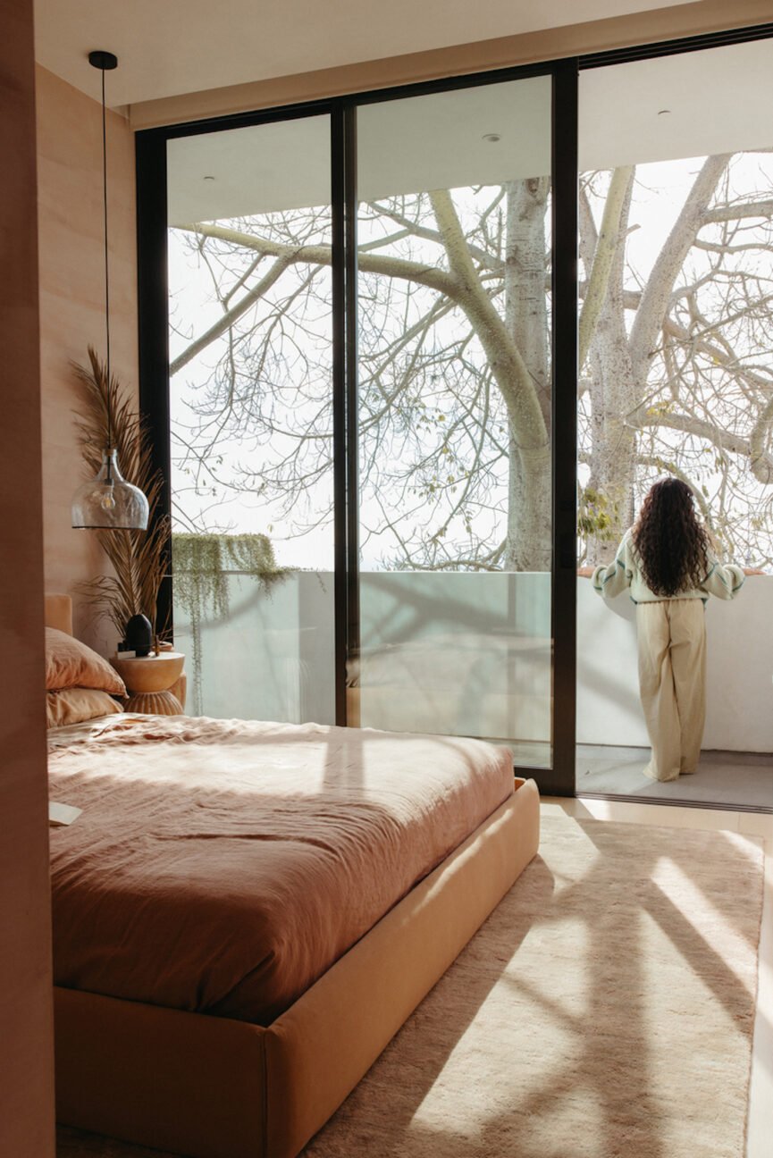 Woman standing outside during morning routine.