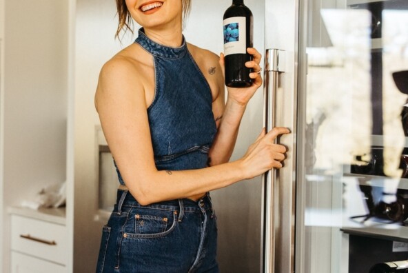 woman with wine for first time dinner party