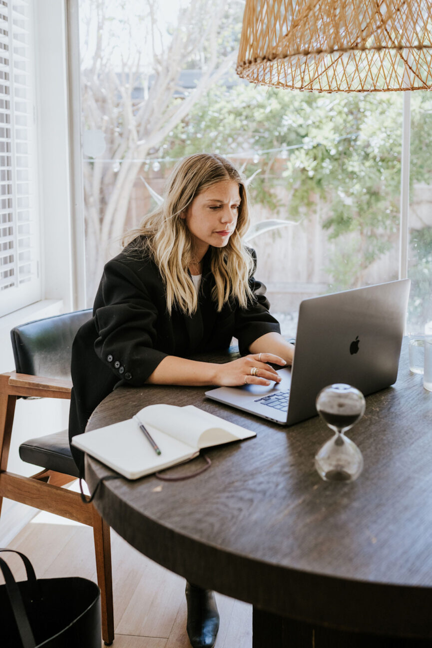 Janessa Leoné works at her desk.