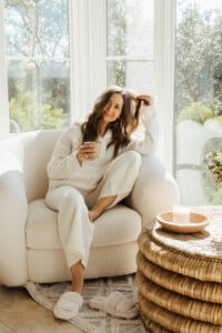 Camille Styles drinking coffee.