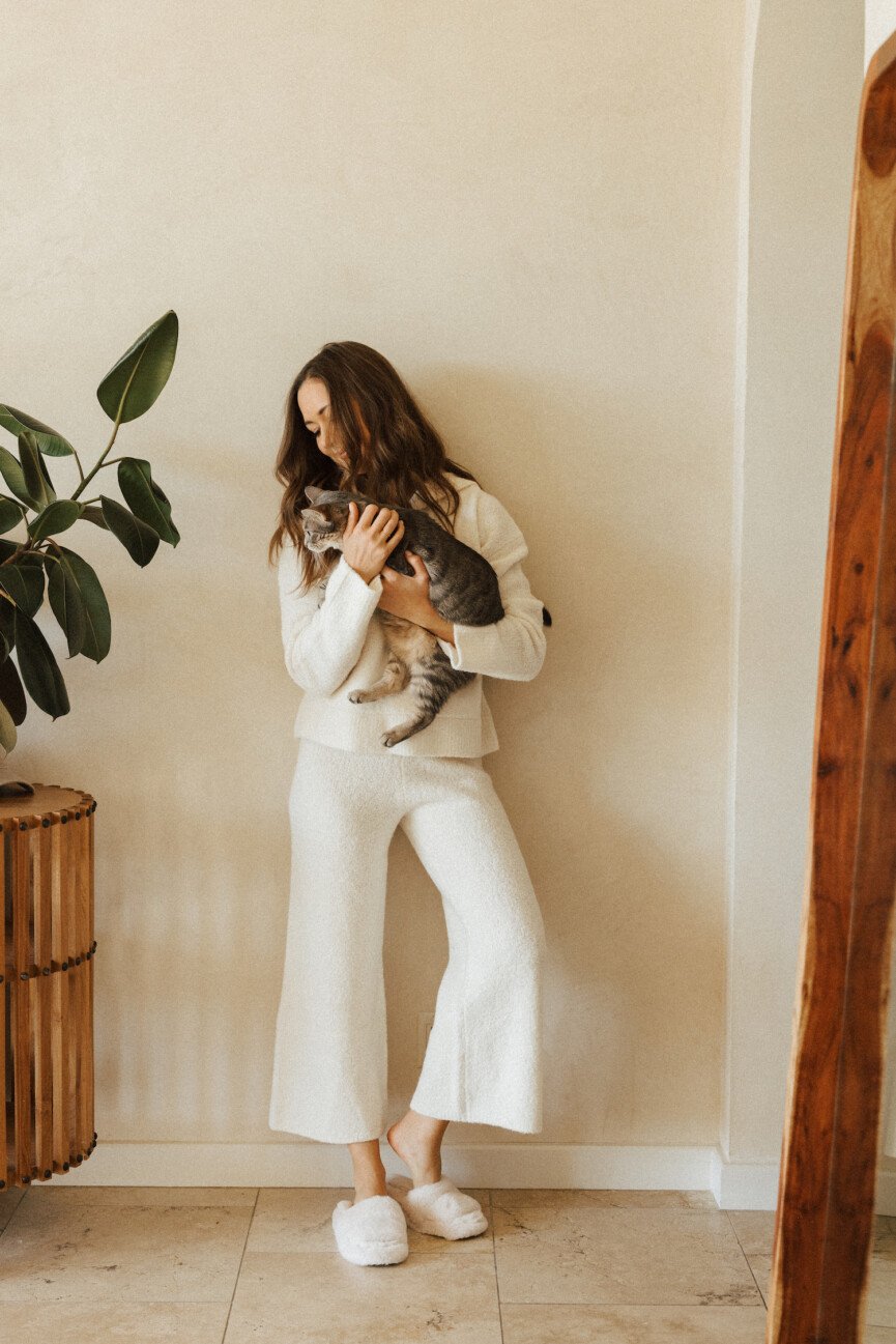 Camille Styles holding cat