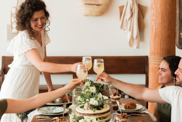 hostess gift ideas guests cheersing over table