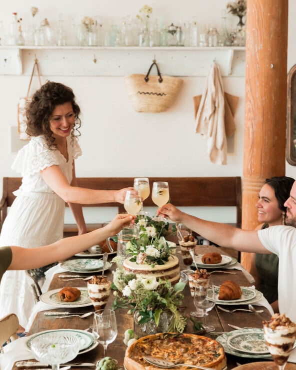 hostess gift ideas guests cheersing over table