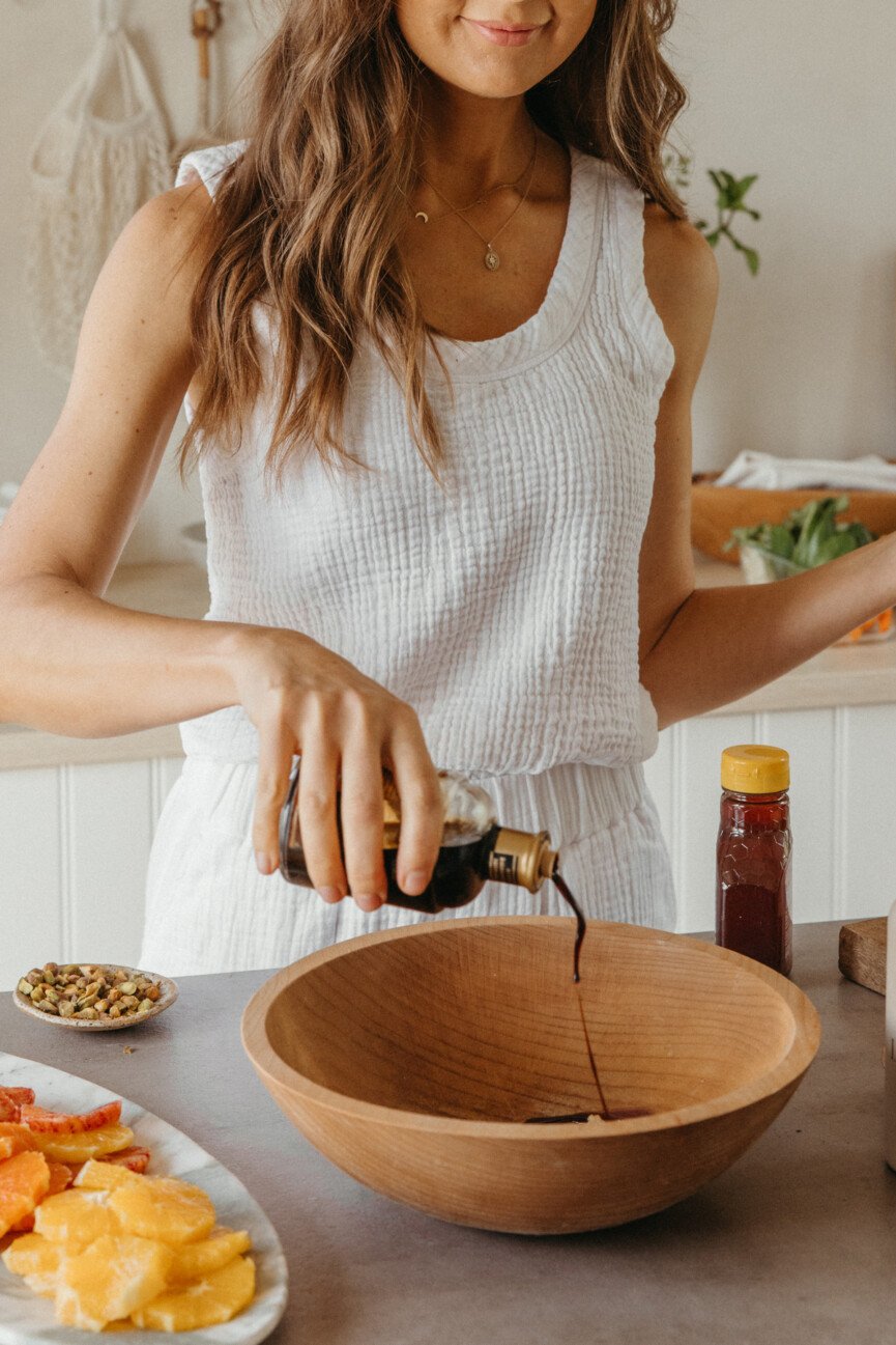 hostess prepping salad