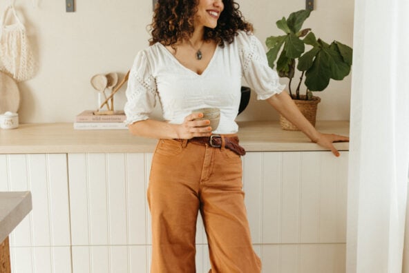 Woman drinking coffee in a coffee nook_healthy energy drinks