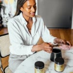 Woman portioning supplements.