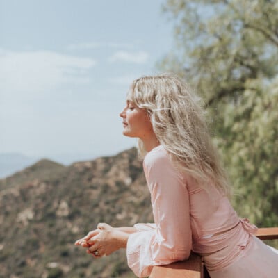 Woman wearing pink dress.