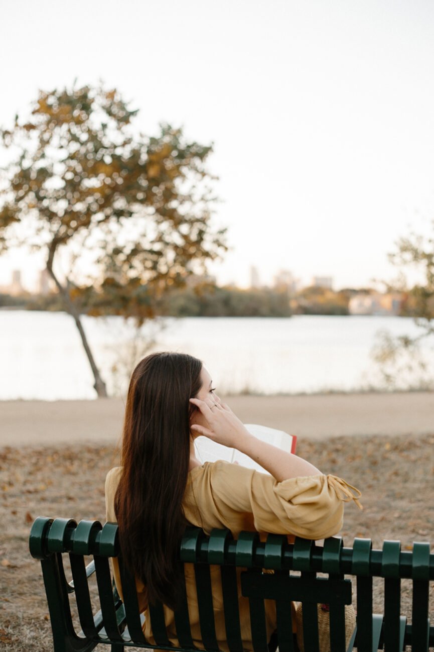 Woman reading outside.